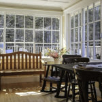 The sunroom at The Point is perhaps one of the most striking features of this large family cottage.